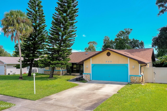 view of front of house featuring a garage and a front yard