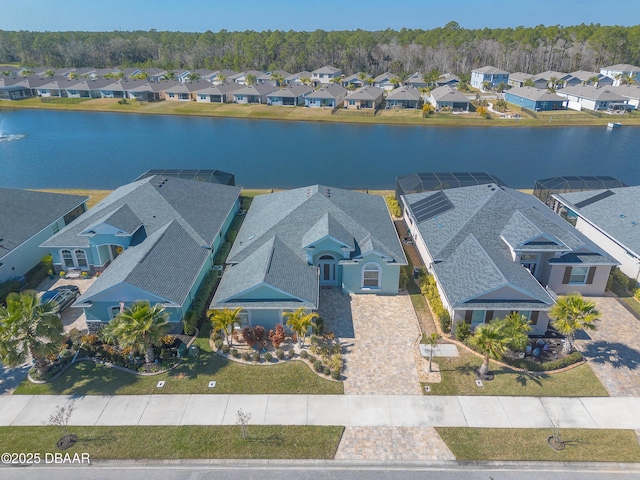 birds eye view of property featuring a water view