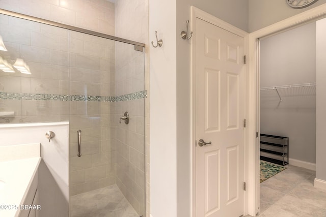 bathroom with vanity and an enclosed shower