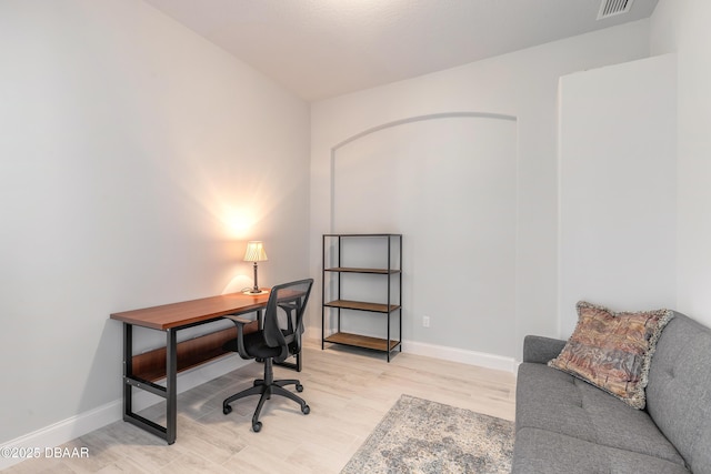 office area with light wood-type flooring