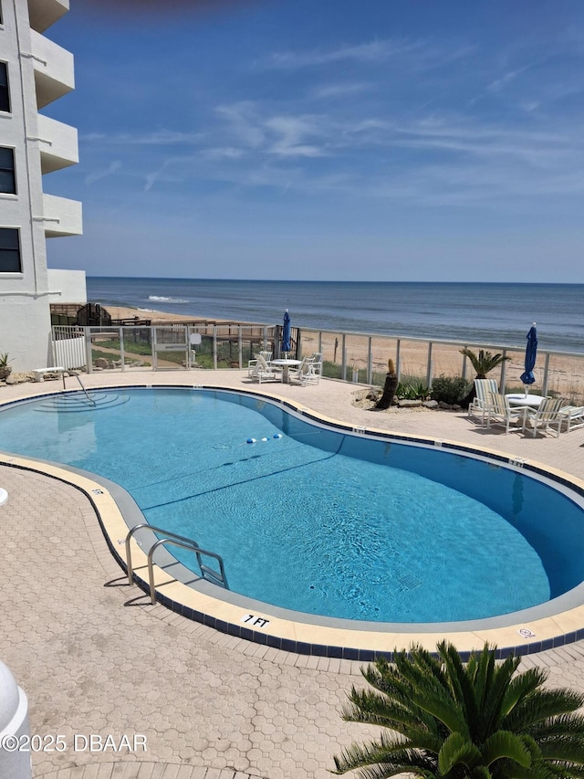 1415 Ocean Shore Blvd Unit 106, Ormond Beach, FL 32176 - community pool with a water view and a patio area