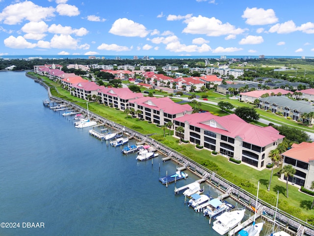 bird's eye view with a water view