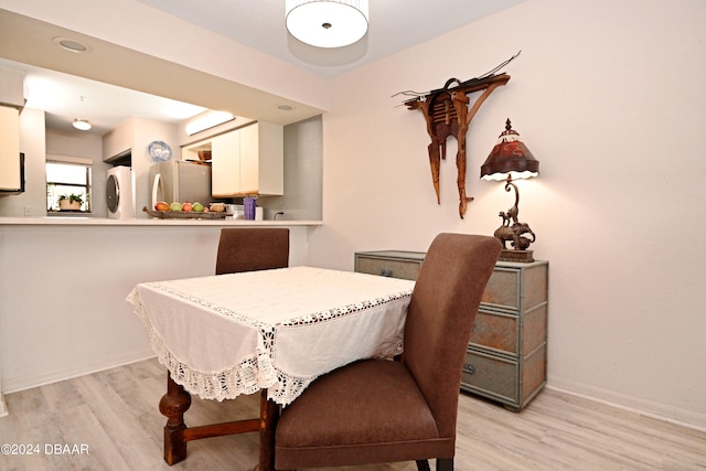 dining room featuring light hardwood / wood-style flooring