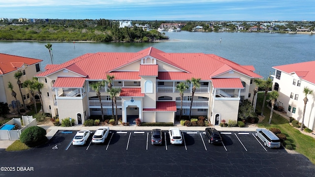 drone / aerial view with a water view