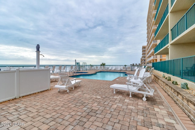 pool with a patio