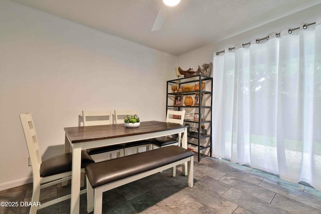 dining room with ceiling fan