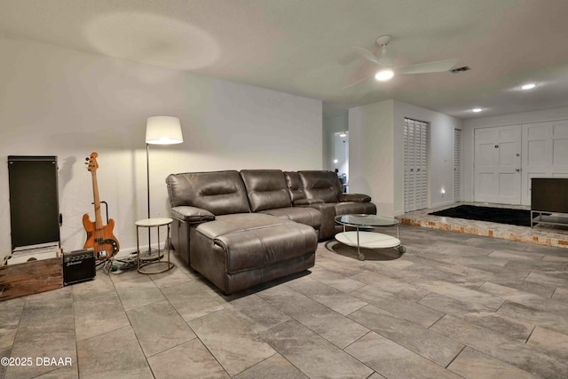 living room with ceiling fan