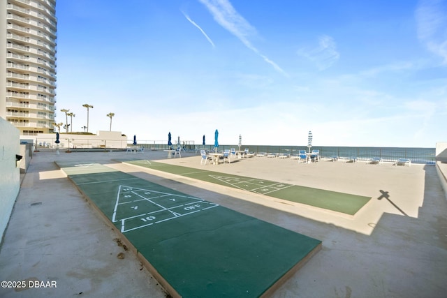 view of home's community with a view of the beach and a water view