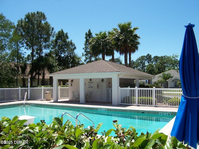 view of swimming pool featuring a gazebo