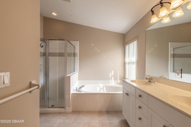 bathroom featuring tile patterned floors, independent shower and bath, and vaulted ceiling