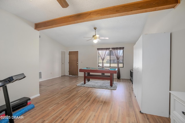 game room featuring pool table, lofted ceiling with beams, a textured ceiling, light wood-type flooring, and ceiling fan