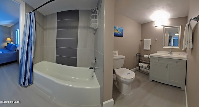 full bathroom featuring vanity, toilet, and shower / bath combo with shower curtain