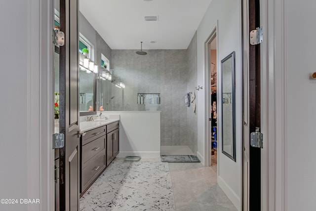6232 W Fallsgrove Ln, Port Orange, FL 32128 - bathroom featuring vanity and tiled shower