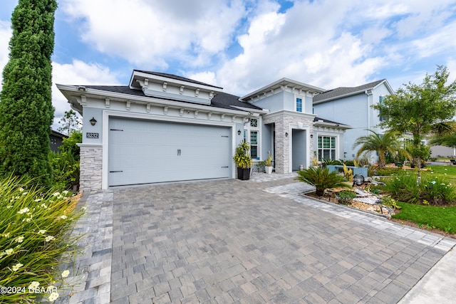 view of front of property featuring a garage