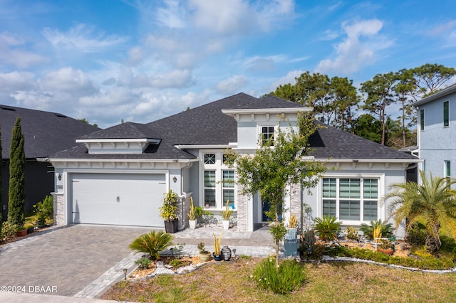 6232 W Fallsgrove Ln, Port Orange, FL 32128 - view of front of home with a garage