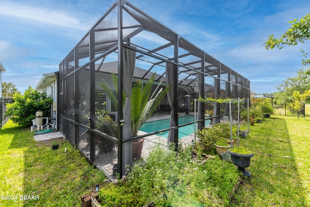 6232 W Fallsgrove Ln, Port Orange, FL 32128 - view of swimming pool with glass enclosure and a lawn