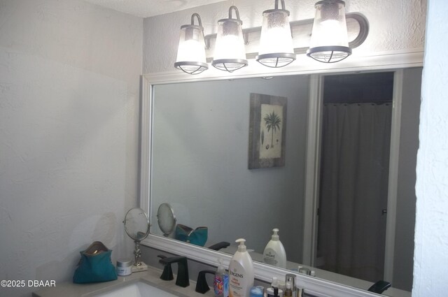 1101 Monticello Ln Unit 3, Port Orange, FL 32129 - bathroom featuring vanity and a textured wall
