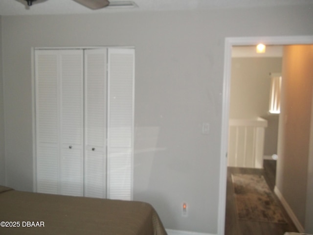 1101 Monticello Ln Unit 3, Port Orange, FL 32129 - bedroom with baseboards and a closet