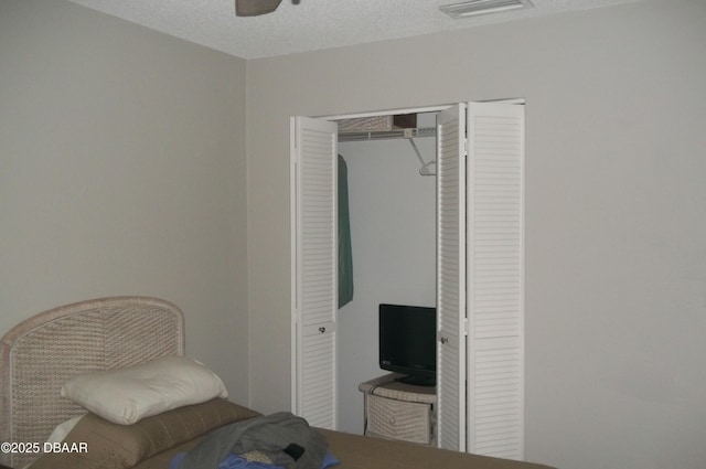 1101 Monticello Ln Unit 3, Port Orange, FL 32129 - bedroom featuring a closet and dark wood-style flooring