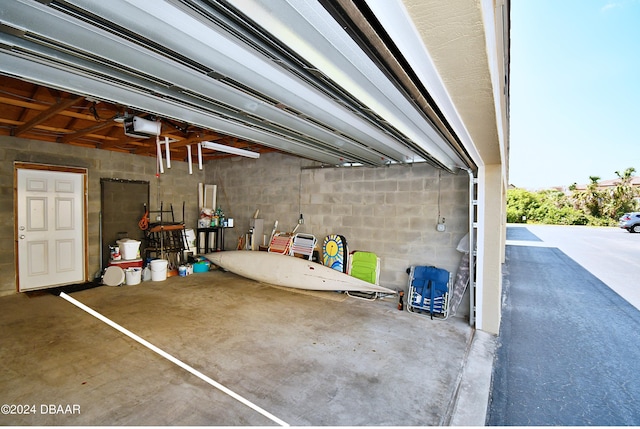 garage featuring a garage door opener