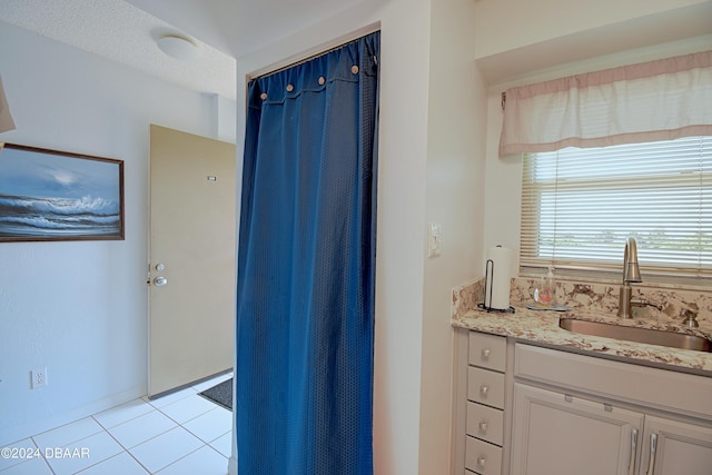 bathroom featuring vanity and tile patterned floors