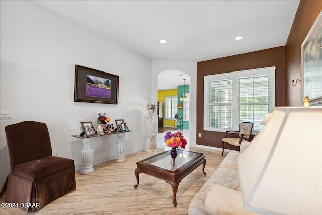 living room with a textured ceiling