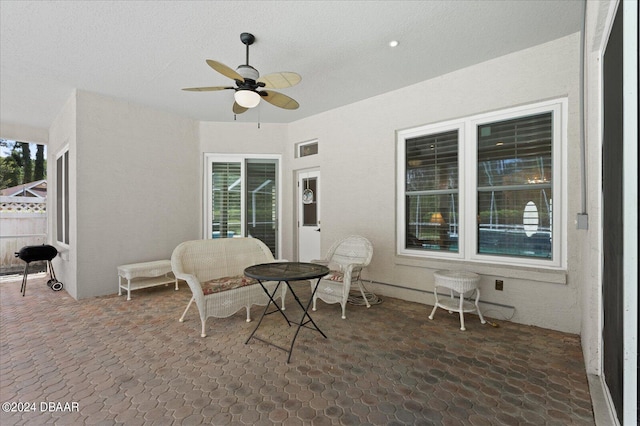 view of patio with ceiling fan