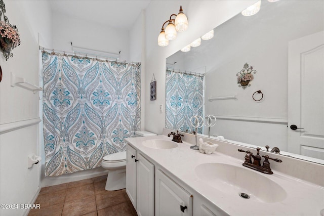 full bathroom featuring toilet, vanity, tile patterned floors, and shower / bathtub combination with curtain