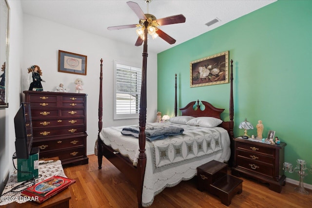 bedroom featuring hardwood / wood-style flooring and ceiling fan