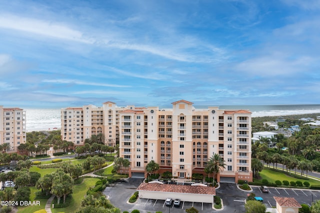 view of building exterior with a water view