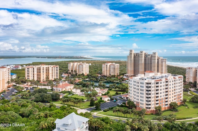 bird's eye view with a view of the beach and a water view