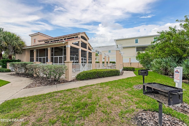 view of community featuring a yard