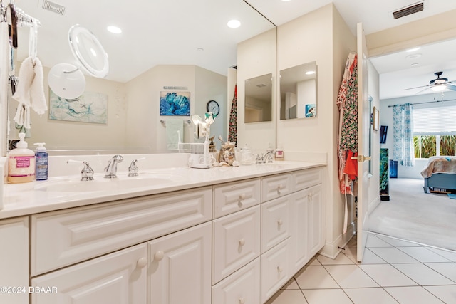 bathroom featuring ceiling fan, vanity, and tile patterned flooring