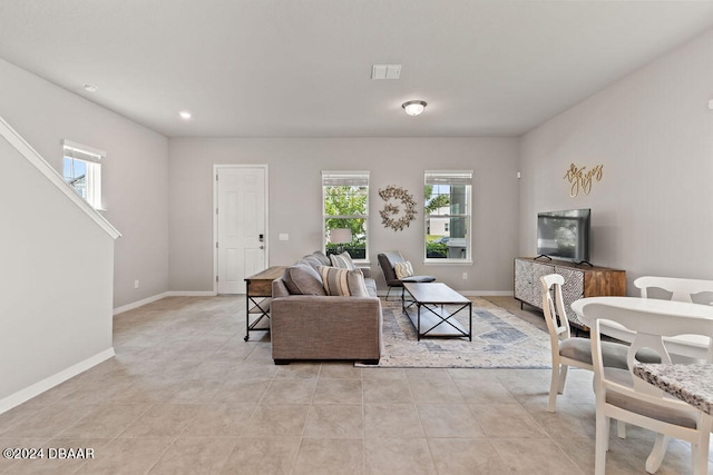 living room featuring light tile patterned floors