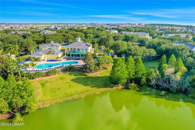 707 Gran Bahama Blvd, Davenport, FL 33897 - aerial view of a pool area, a large body of water, and a tree filled landscape