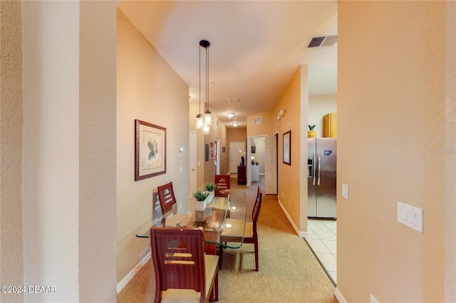 707 Gran Bahama Blvd, Davenport, FL 33897 - hallway with baseboards and light colored carpet