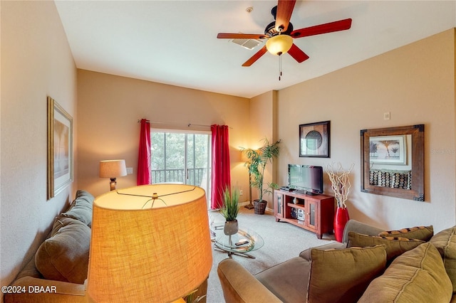 707 Gran Bahama Blvd, Davenport, FL 33897 - living area featuring carpet, a ceiling fan, and baseboards