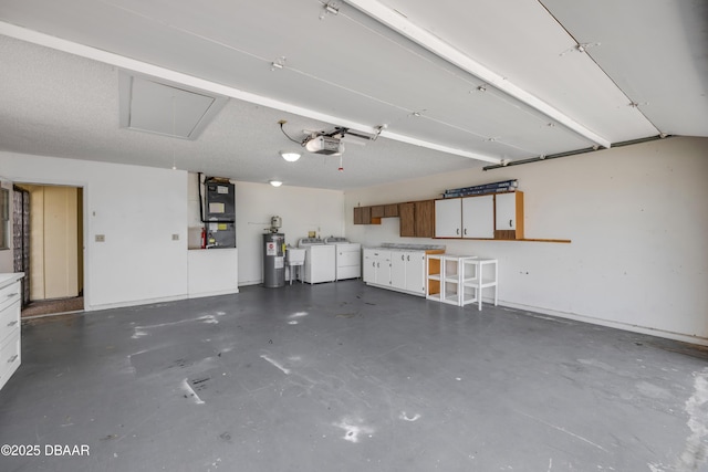 garage with separate washer and dryer, a garage door opener, water heater, and heating unit