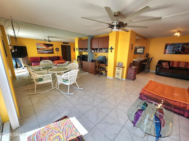 living room with ceiling fan