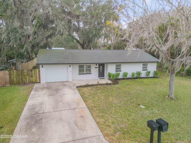 single story home with a garage and a front yard