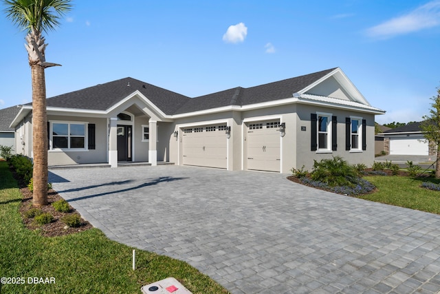 single story home with a garage