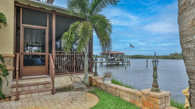 dock area with a water view