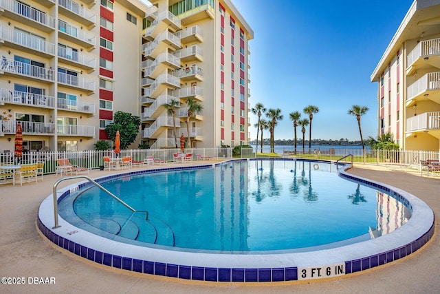 view of pool featuring a patio area