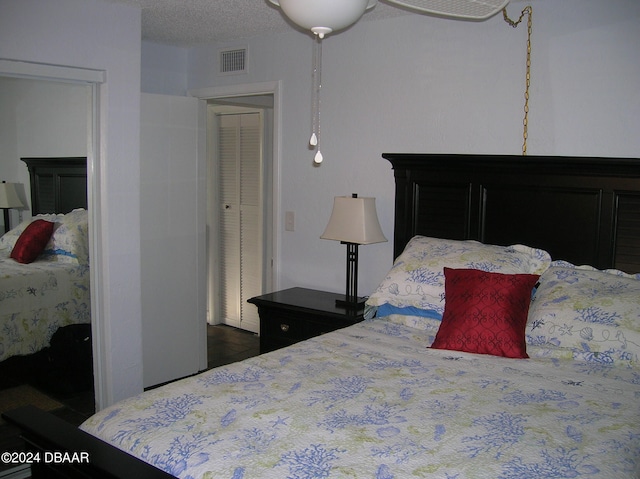 bedroom with a textured ceiling