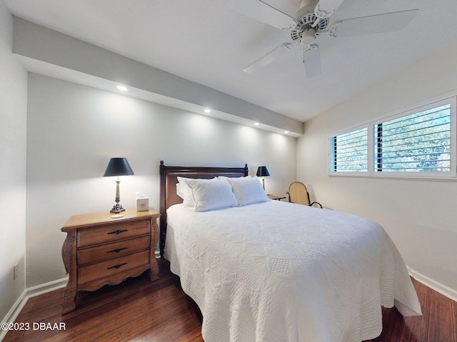 520 S Peninsula Ave Unit 2D7, New Smyrna Beach, FL 32169 - bedroom featuring dark wood-type flooring and ceiling fan