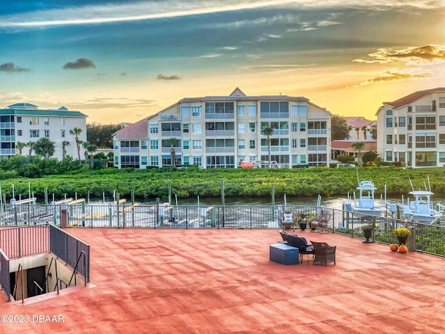 520 S Peninsula Ave Unit 2D7, New Smyrna Beach, FL 32169 - view of dock featuring a water view