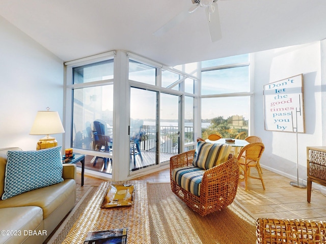 520 S Peninsula Ave Unit 2D7, New Smyrna Beach, FL 32169 - sunroom / solarium featuring ceiling fan