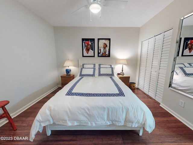 520 S Peninsula Ave Unit 2D7, New Smyrna Beach, FL 32169 - bedroom featuring ceiling fan, a closet, and dark hardwood / wood-style flooring