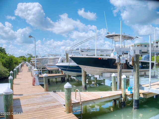 520 S Peninsula Ave Unit 2D7, New Smyrna Beach, FL 32169 - dock area featuring a water view