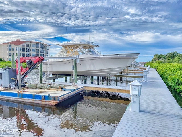 520 S Peninsula Ave Unit 2D7, New Smyrna Beach, FL 32169 - dock area featuring a water view